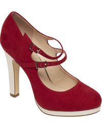 Louboutin wint opnieuw: Van Haren mag geen pumps met rode zolen verkopen  voor een paar tientjes