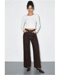 Bianco Lucci - High Waist Wide Leg Denim Trousers With Belt - Lyst