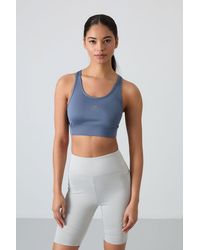 TOMMY LIFE - Fitted Sleeveless Crop Sports Top - Lyst