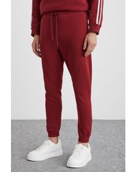 Grimelange - Tapered Joggers With Pocket - Lyst