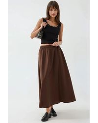 Busem - Elastischer Taillenslip Midi-Rock Mit Taschen - Lyst