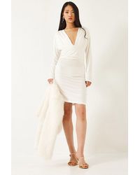 Bianco Lucci - Bodycon Mini Dress With Ruched Detail And V-Neck - Lyst