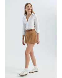 Hiccup - Mid Rise Pleated Mini Skirt With A Belt - Lyst