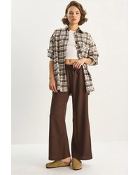 Bianco Lucci - Wide Leg Palazzo Pants With Tie Closure - Lyst