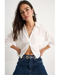 Bianco Lucci - Textured Striped Crop Shirt With Button Closure And Pocket - Lyst