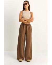 Bianco Lucci - Wide Leg Cotton Trousers With Drawstring Waist - Lyst
