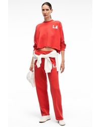 Grimelange - Wide Leg Text Print Joggers - Lyst
