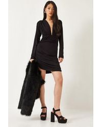 Bianco Lucci - Bodycon Mini Dress With Ruched Detail And V-Neck - Lyst