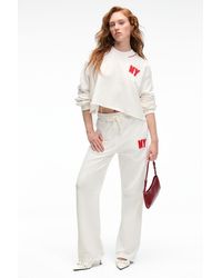 Grimelange - Wide Leg Text Print Joggers - Lyst