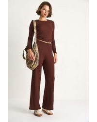Bianco Lucci - Fitted Two-Piece Coord Set With Flared Pants - Lyst