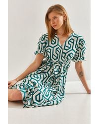 Bianco Lucci - Geometric Pattern V-Neck Midi Dress With Belt - Lyst