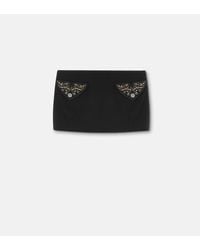 Versace - Fitted Mini Skirt With Flap Pockets - Lyst