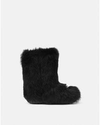 Versace - Gianni Ribbon Shearling Boots - Lyst