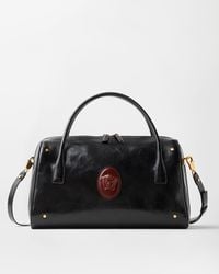 Versace - Roomy Large Leather Duffel Bag - Lyst