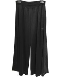 pantaloni adidas flared pantaloni adidas flared