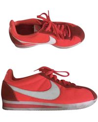 pink cortez sneakers