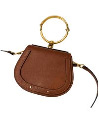 nile minaudière leather crossbody bag