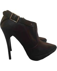 Burberry Leather Buckled Boots - Brown