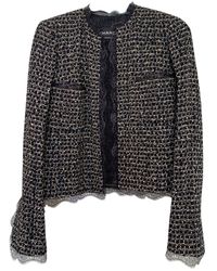 Chanel Vest en Tweed Noir