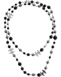 Chanel Collar largos en metal negro CC
