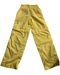 pantalones nike mujer amarillo