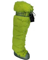 Moncler Bottes fourrées en fourrure synthétique - Jaune