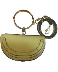 nile minaudière leather crossbody bag