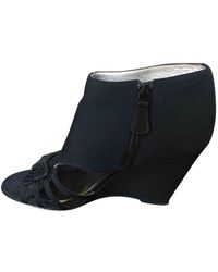 Chanel Sandalias en cuero negro