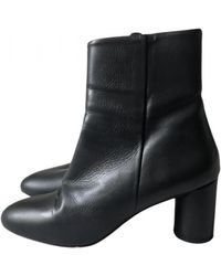 cos sculptural leather ankle boots