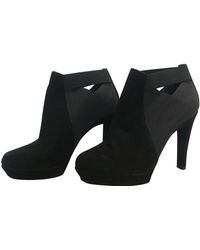 donna karan white booties