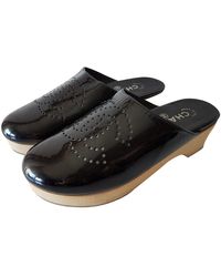 Chanel Lackleder Clogs - Schwarz