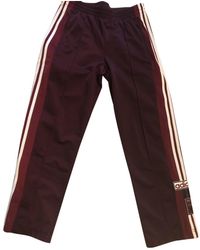 pantaloni adidas larghi