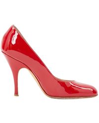 Dolce & Gabbana Tacones en charol rojo \N