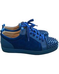 all blue chucks with the gold spikes