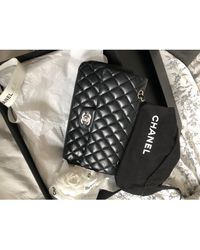 Chanel Sac pochette en cuir cuir Timeless noir