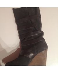 Sandro Bottes à compensés daim noir