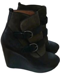 Sandro Bottines & low boots à compensés cuir marron
