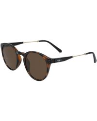 Calvin Klein - Ckj20705S 235 Sunglasses Injected Round Normal Photochromatic - Lyst