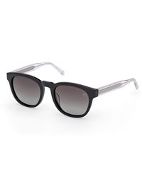 Timberland - Tb00060 01D Sunglasses Acetate Smoke Round Polarized - Lyst