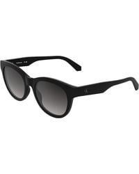 Calvin Klein - Ckj26600S 001 Sunglasses Bio-Injected Smoke Round Normal - Lyst
