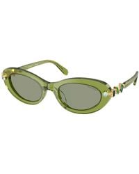 Swarovski - Sk6042 3002/2 Sunglasses Acetate Round Normal - Lyst