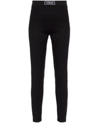 Versace - Leggings With Logo Patch - Lyst