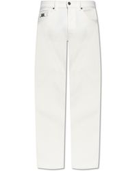 Versace - Jeans With Tapered Legs - Lyst