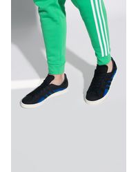 black adidas campus shoes