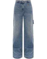 Courreges - Jeans With Asymmetrical Legs - Lyst