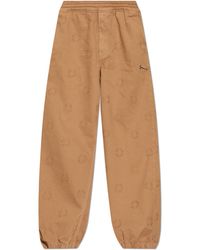 Givenchy - Cotton Trousers With Logo-Shaped Appliqué - Lyst