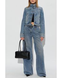 Courreges - Jeans With Asymmetrical Legs - Lyst