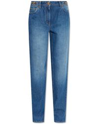 Versace - Jeans With Logo - Lyst