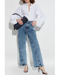 Alaïa - High-Waisted Jeans - Lyst