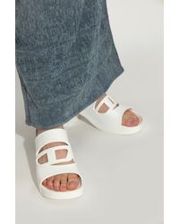 DIESEL Sa-Bonnie-Heeled Rubber Slides With Cut-Out Logo in Black